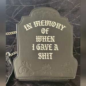 Dolls Kill Tombstone crossbody "In memory of when I gave a shit".